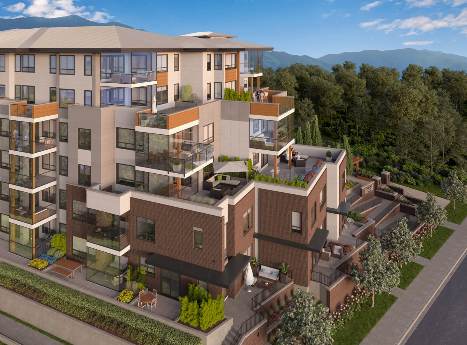 Highpointe Maple Ridge render showing concrete building with ground-level city homes and terraced patios against North Shore mountains