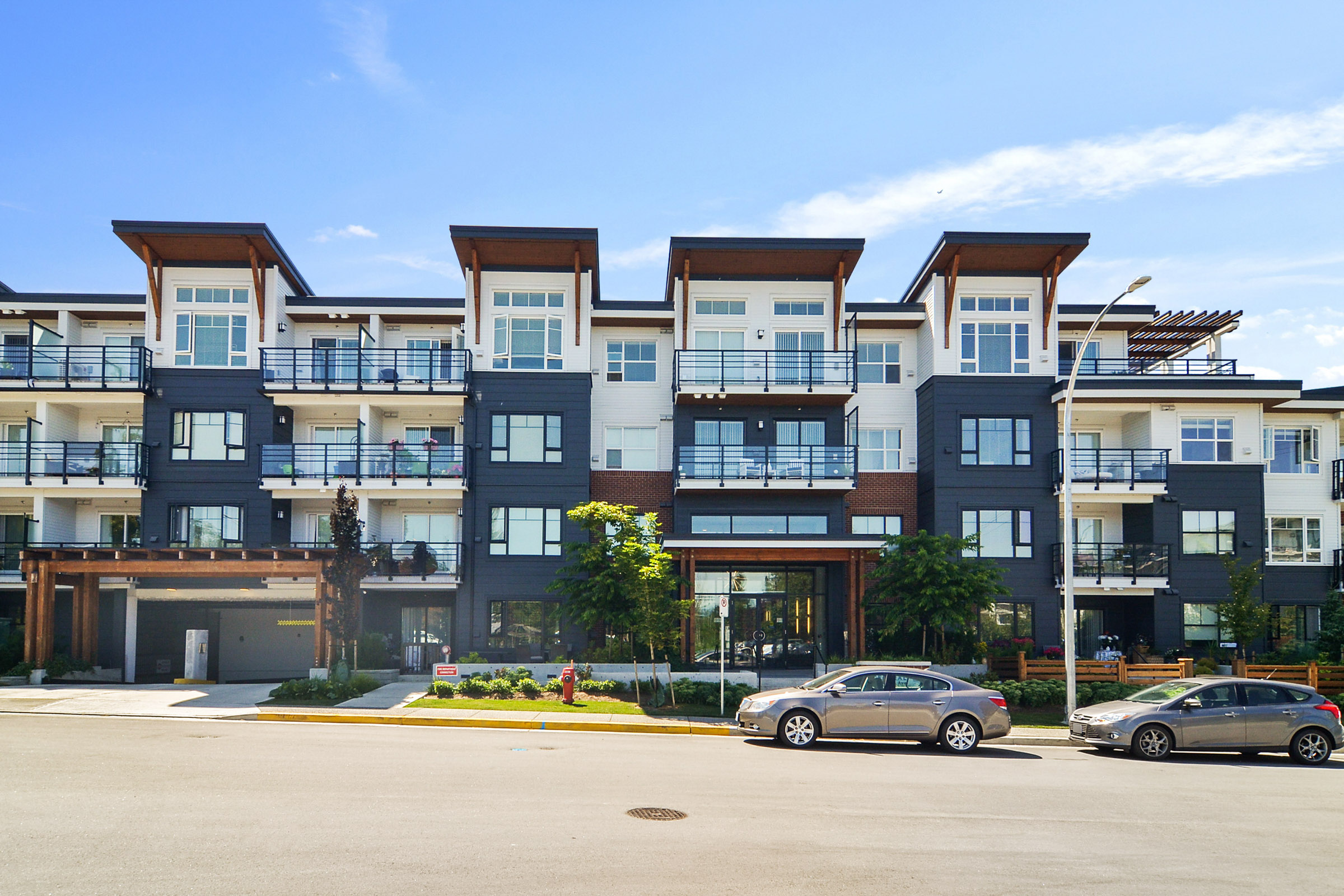 Central by Zenterra in Murrayville, exterior of the 4-storey 48-home West-Coast-inspired building