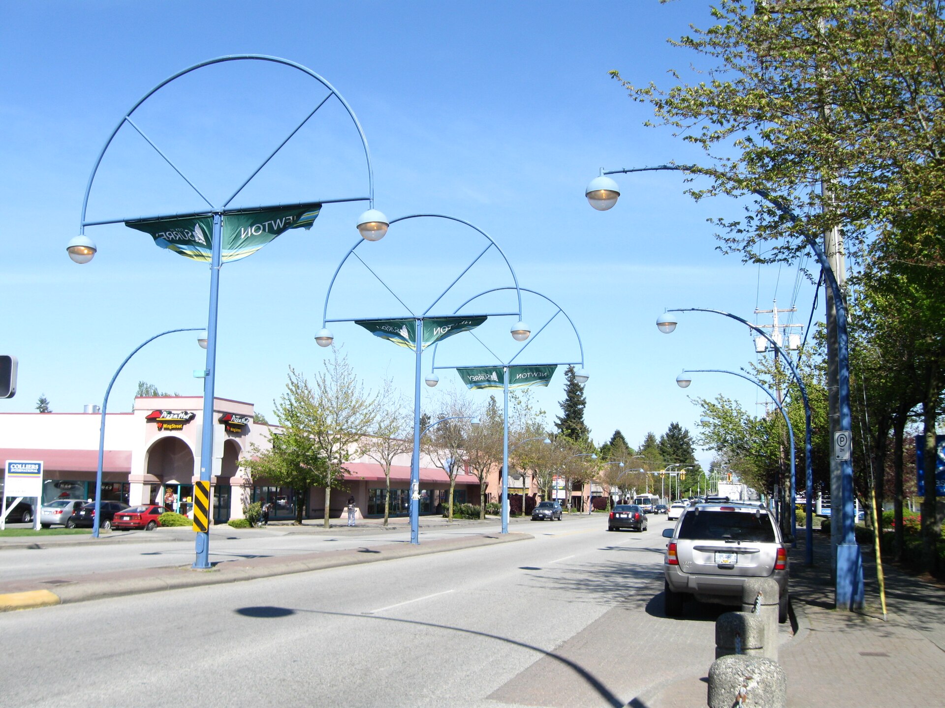 Newton Town Centre on 72 Avenue, the iconic Newton plaza with the distinctive arched lampposts at the heart of the neighbourhood