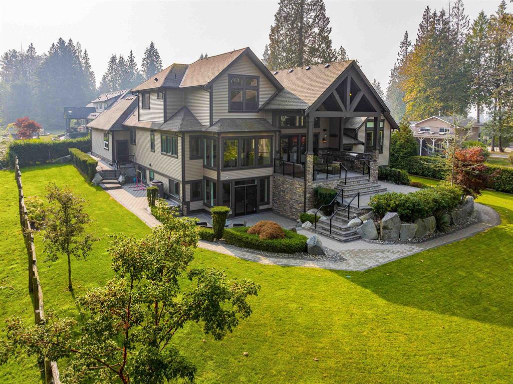 Country-style Websters Corners home with mature trees