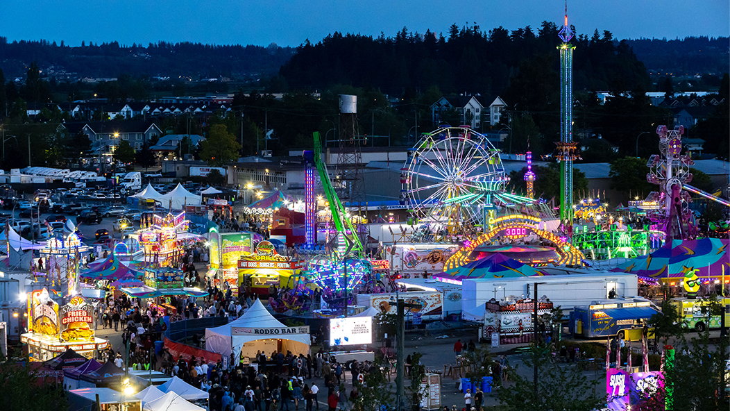 Cloverdale Rodeo midway at dusk