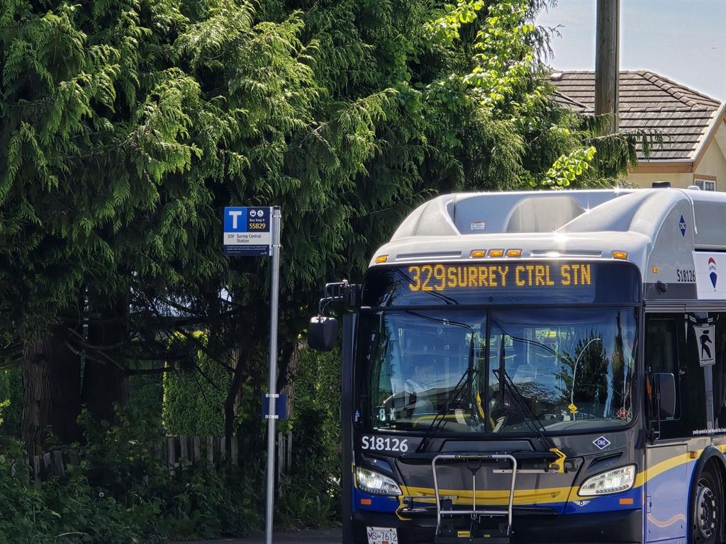 A bus heading to Surrey Central Station at a West Newton bus stop