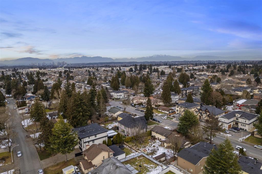 Aerial view over detached homes in Surrey, part of the Fraser Valley market