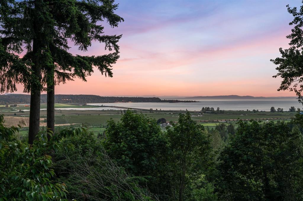Sunset view from Panorama Ridge over farmland toward Boundary Bay