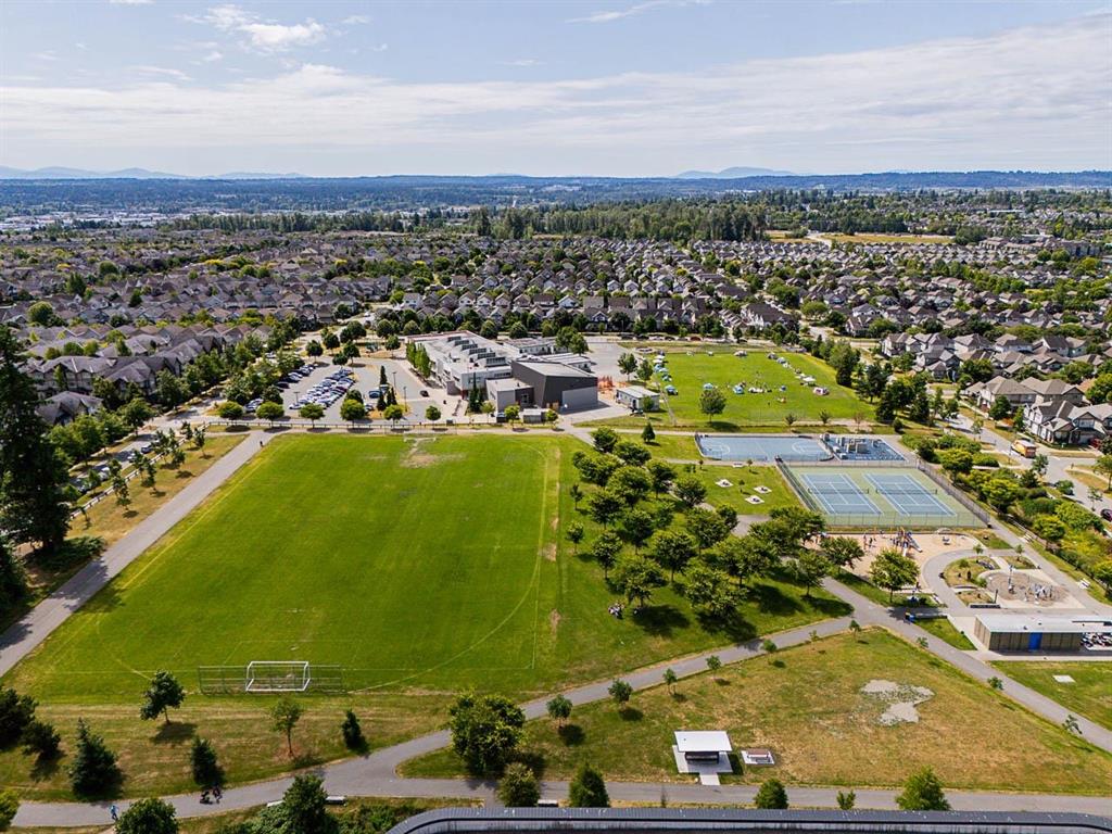 Aerial view of the Clayton community centre, fields and courts in Surrey