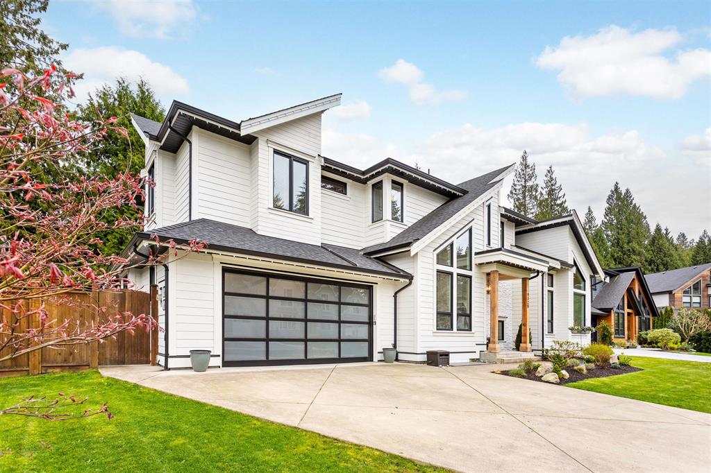 A modern white detached home in Walnut Grove, Langley