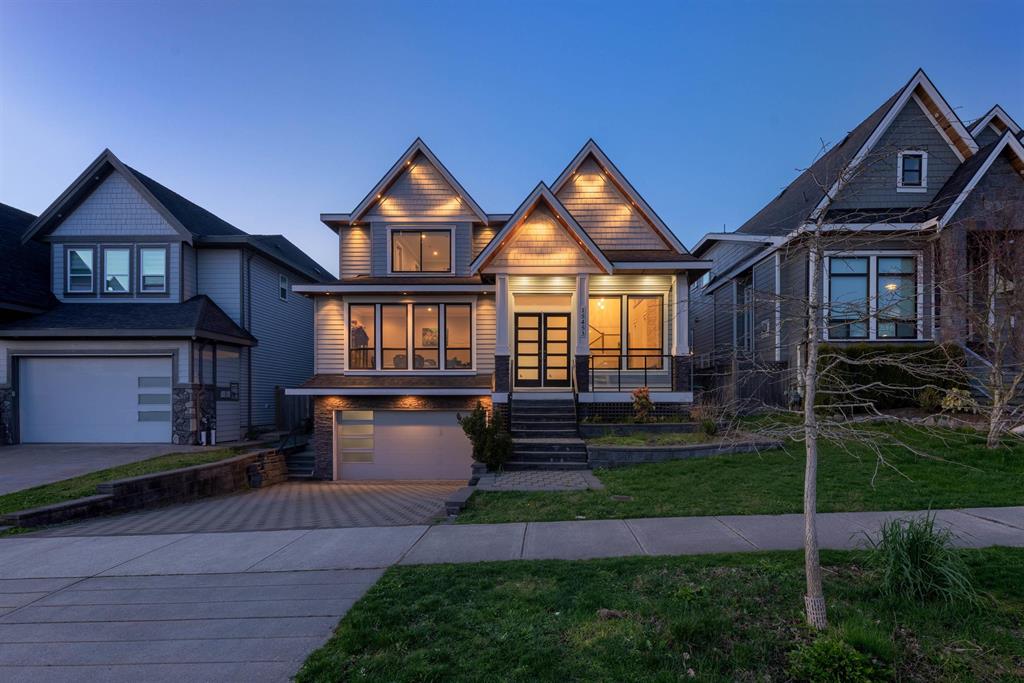 A new detached home at dusk in Fleetwood, Surrey