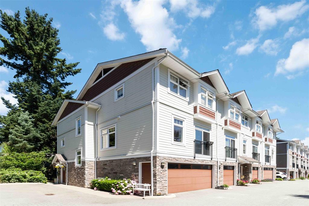 End unit of a townhouse complex on the King George Corridor in Surrey