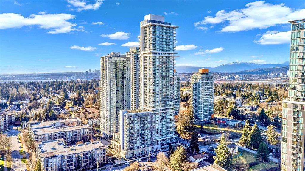 Condo towers in Surrey City Centre, with the North Shore mountains beyond