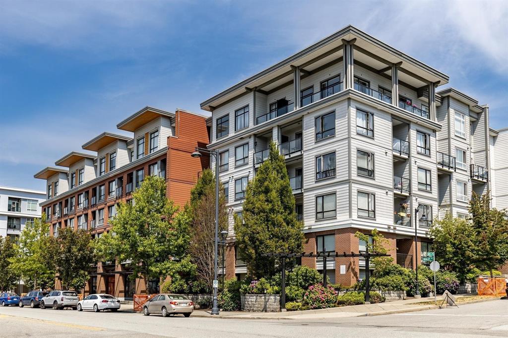 Mid-rise condo buildings on a street corner in Whalley, Surrey