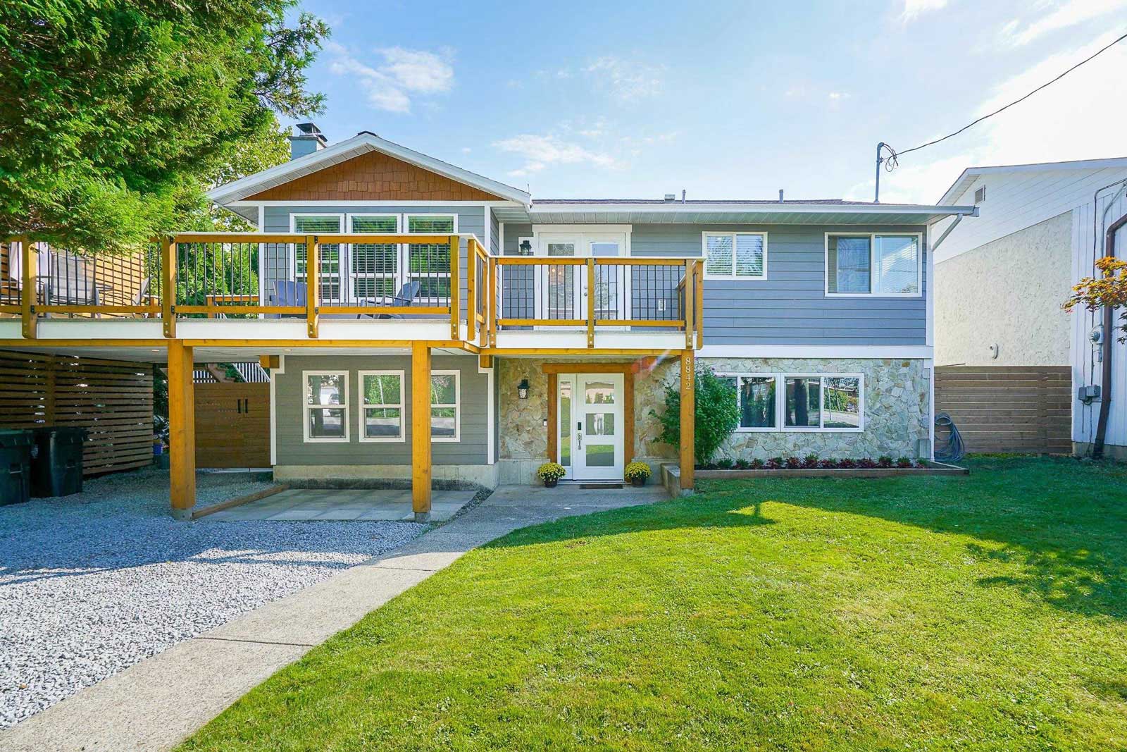 Two-storey home with a raised deck in Walnut Grove, Langley