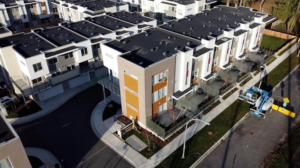 Aerial view of new three-storey townhomes in Cedar Hills, Surrey