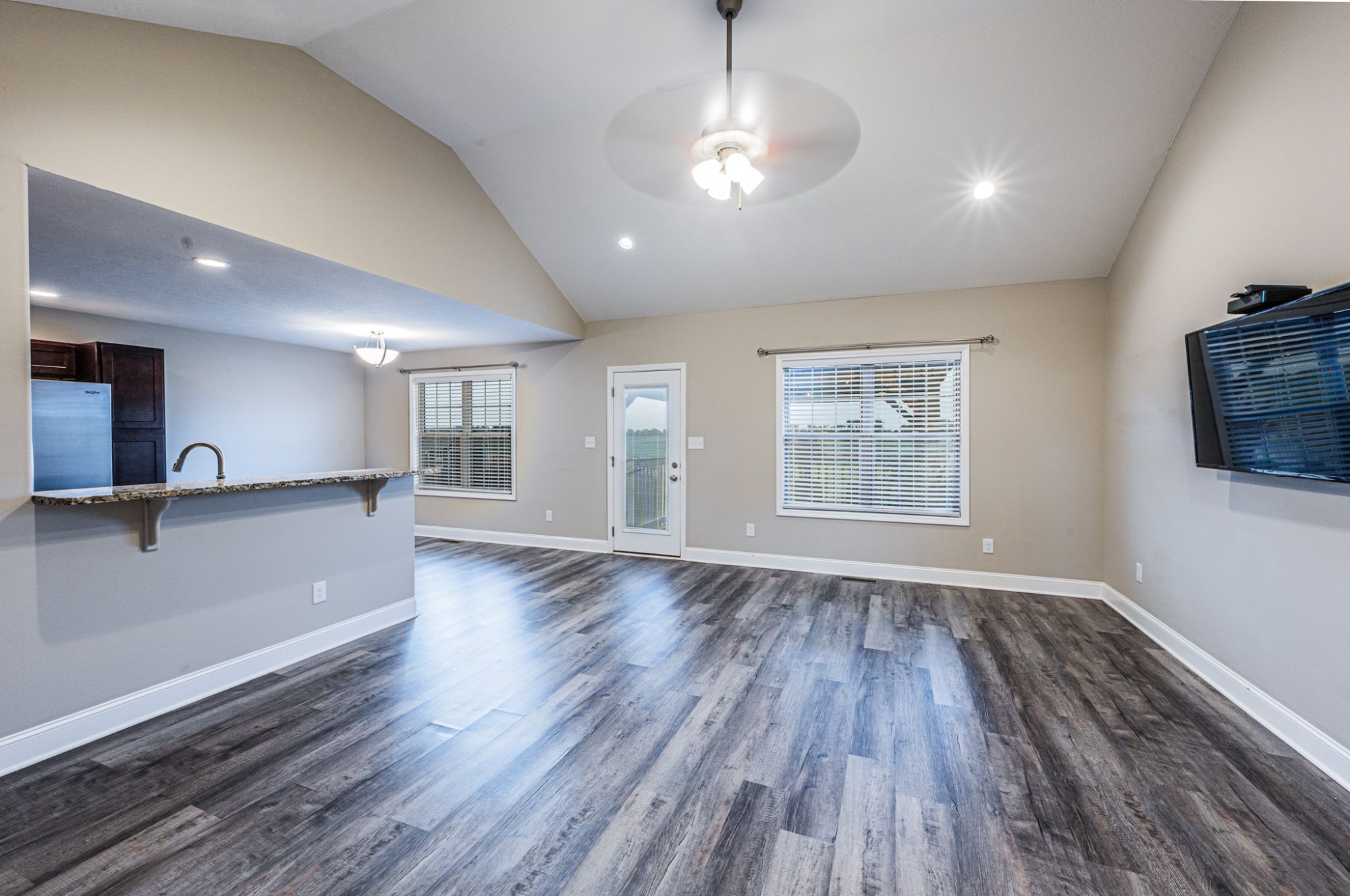 Moving truck in a residential Owensboro KY neighborhood representing sell your home Owensboro KY