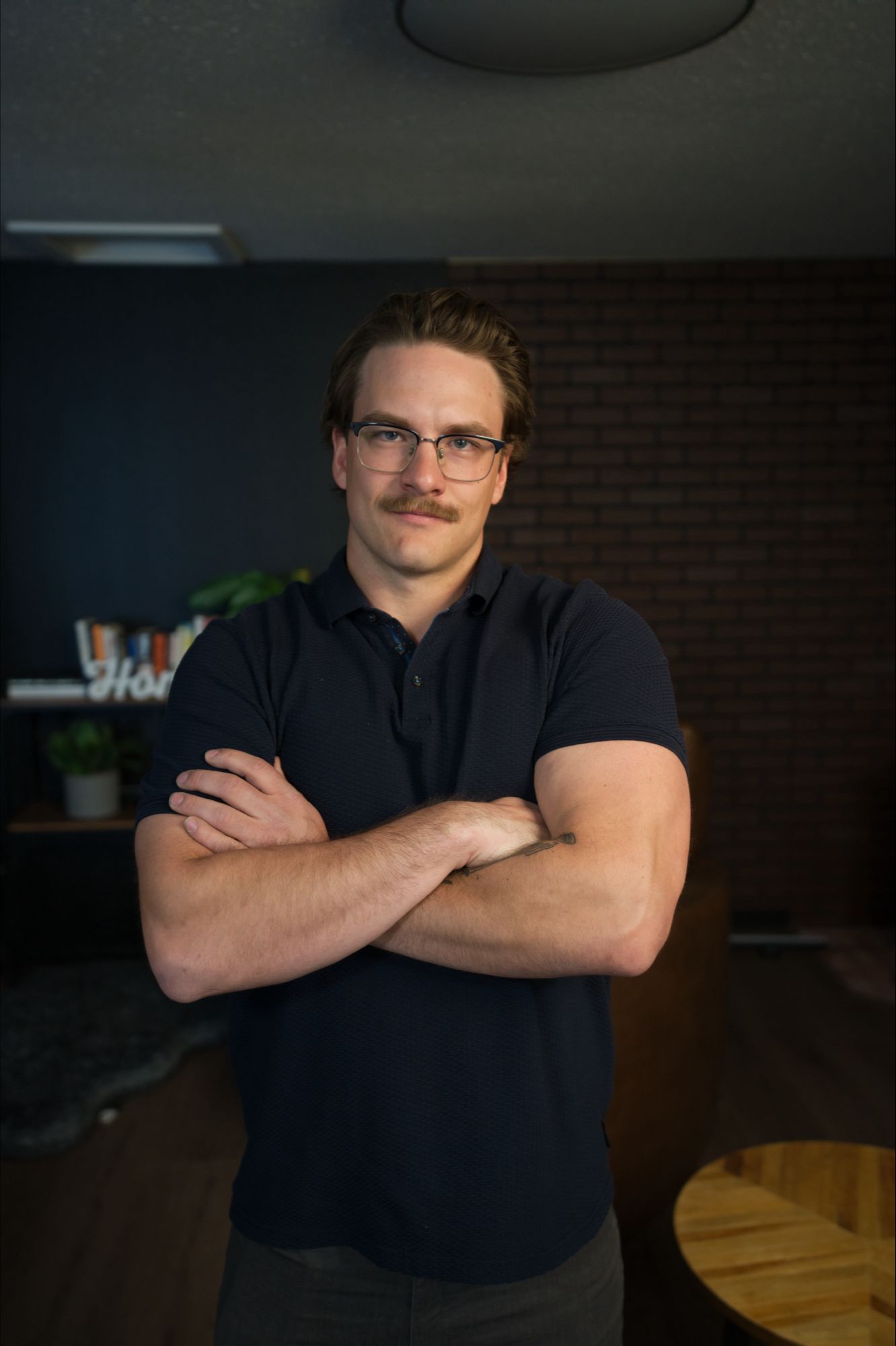Tristan Boire filming content in the Park Realty content studio