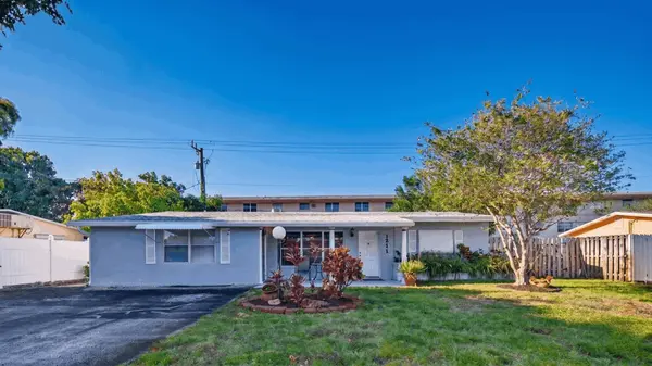feature image of $475K Pompano Beach Home: 3BR + In-Law Suite, No HOA, One Mile from the Ocean