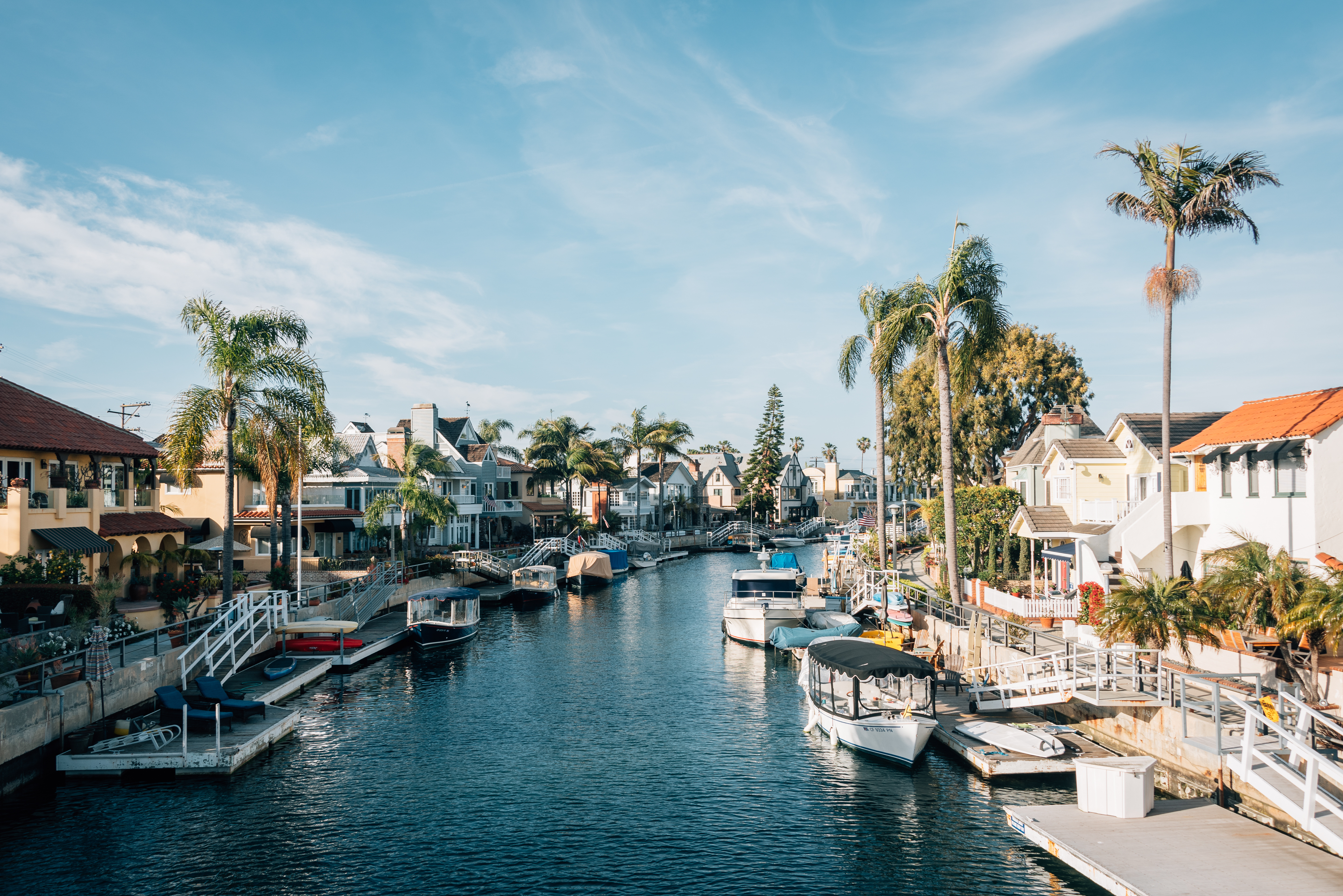 Waterfront homes and boats along the Naples canals in Long Beach, California