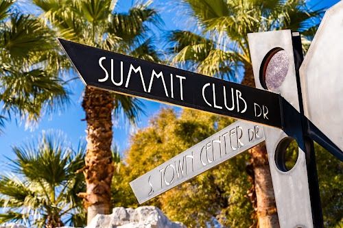 The Summit Club street sign in Summerlin — the benchmark Henderson's guard-gated enclaves compete against