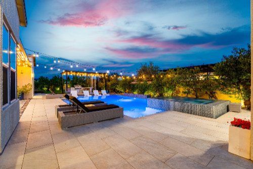 Backyard pool and patio at sunset at a Henderson NV home prepared to sell