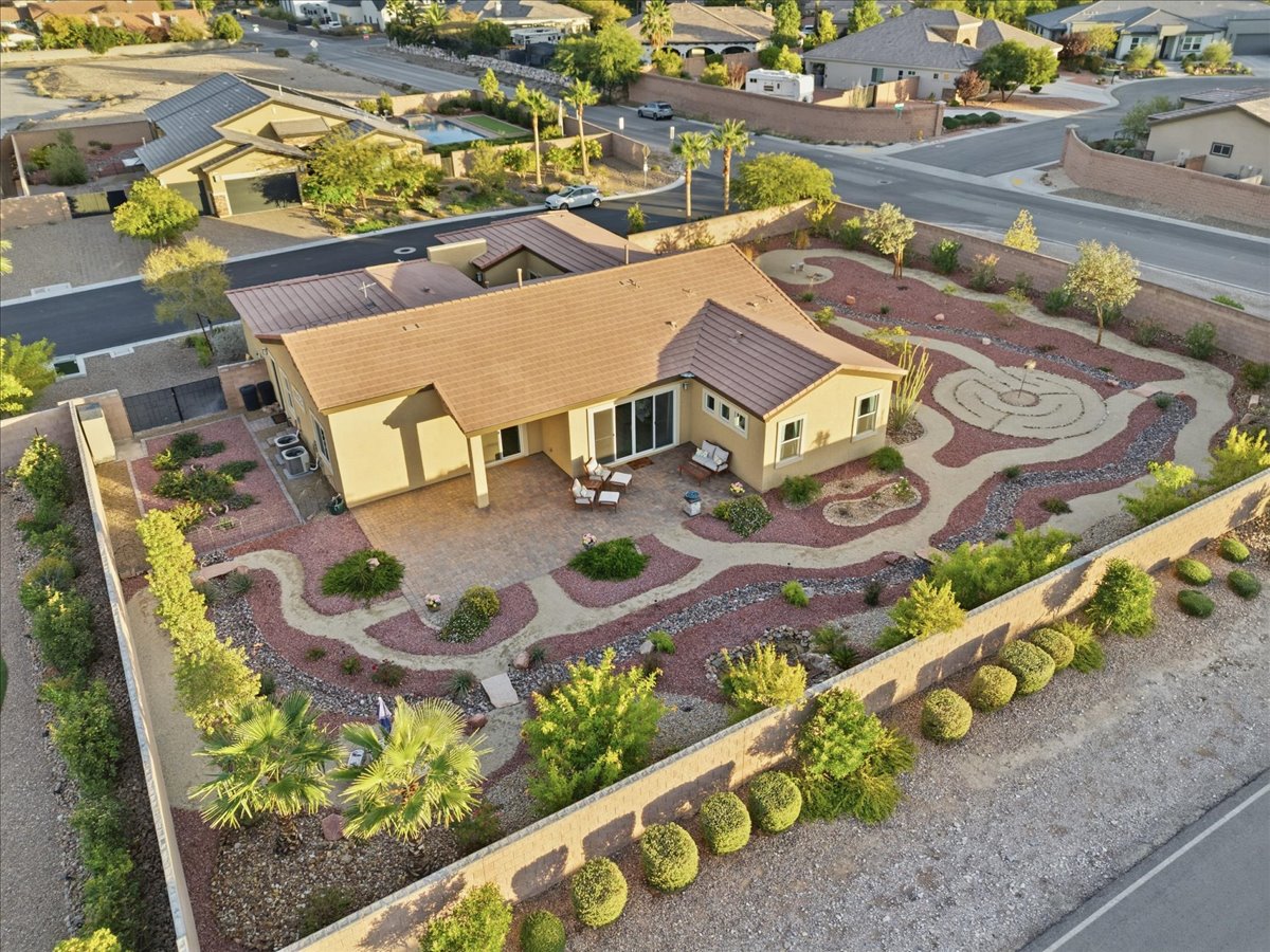 Aerial view of a Las Vegas home with desert landscaping and covered patio
