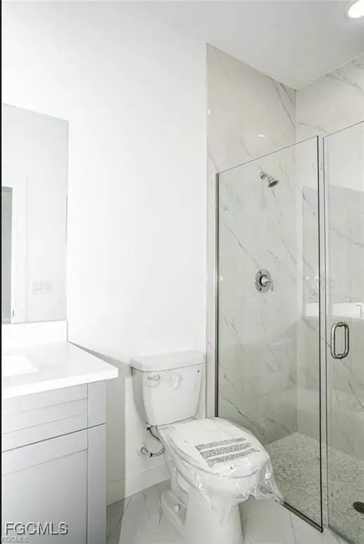 2425/2427 Mansfield AVE S, Lehigh Acres, FL 33973