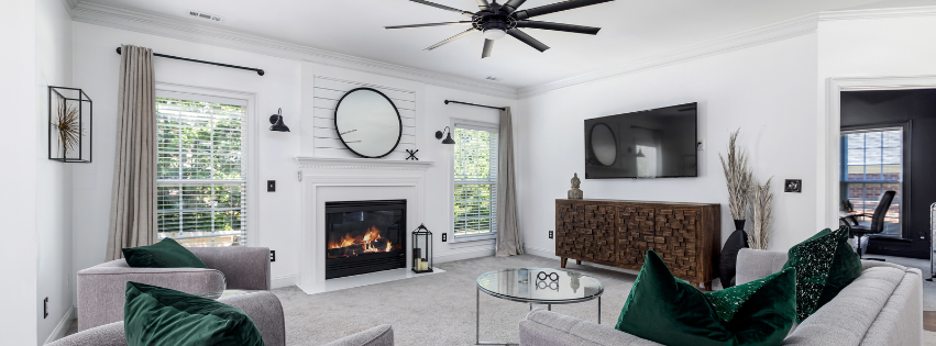 Beautifully staged living room with bright lighting and fresh décor, prepared for a real estate open house showing.