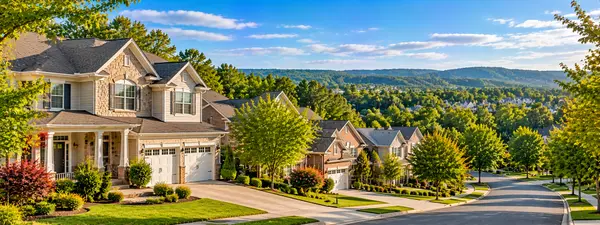 Idyllic Suburban Street Beneath Rolling Hills