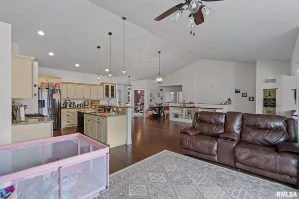 119 PRAIRIE MEADOW DR, Blue Grass, IA 52726