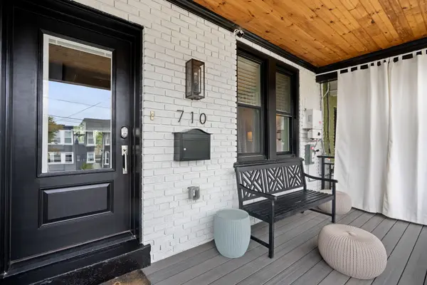 Front porch with wood plank ceiling