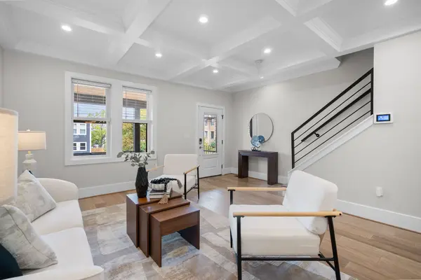 Living room with front windows and entry