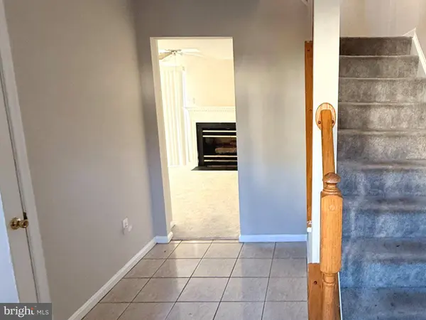 Foyer Entrance that leads to lower level family room