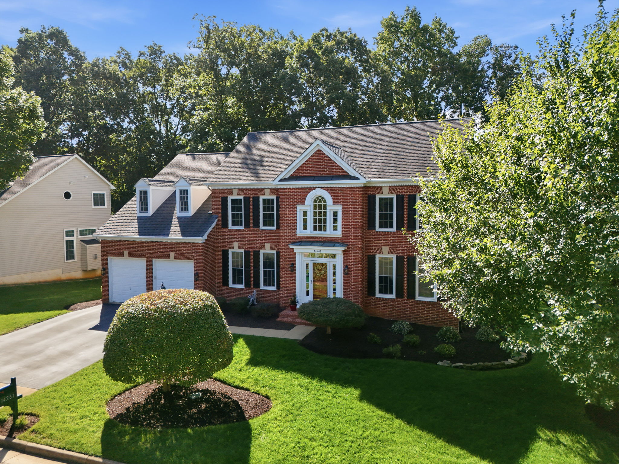 Front exterior of 14261 Clubhouse Road in Gainesville, Virginia
