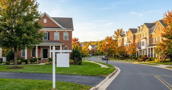 Illustration of a Northern Virginia suburban street in autumn with a brick colonial home, a blank yard sign and a row of townhomes, for a guide to the 2026 housing market reset