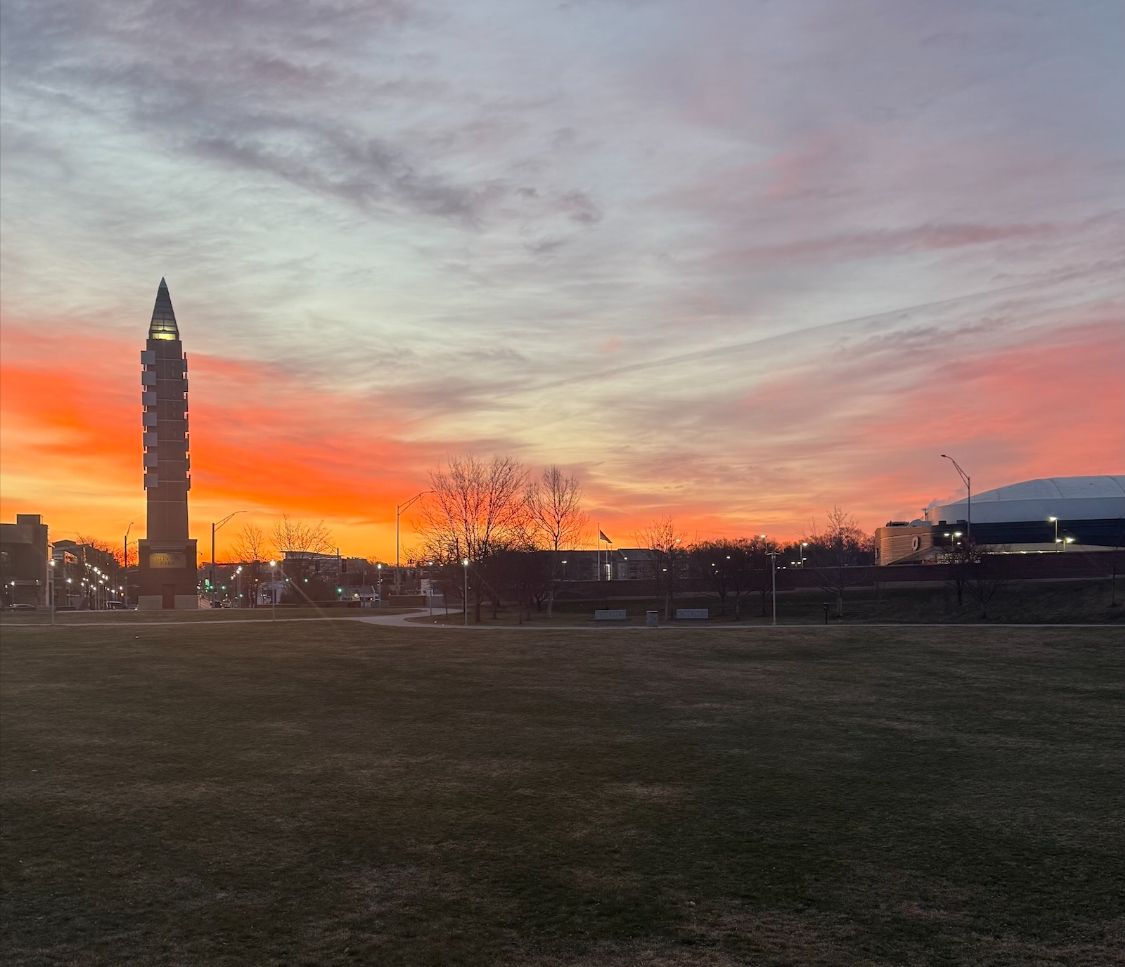 Sunrise over Stinson Park in Aksarben, Omaha, with Baxter Arena in the background