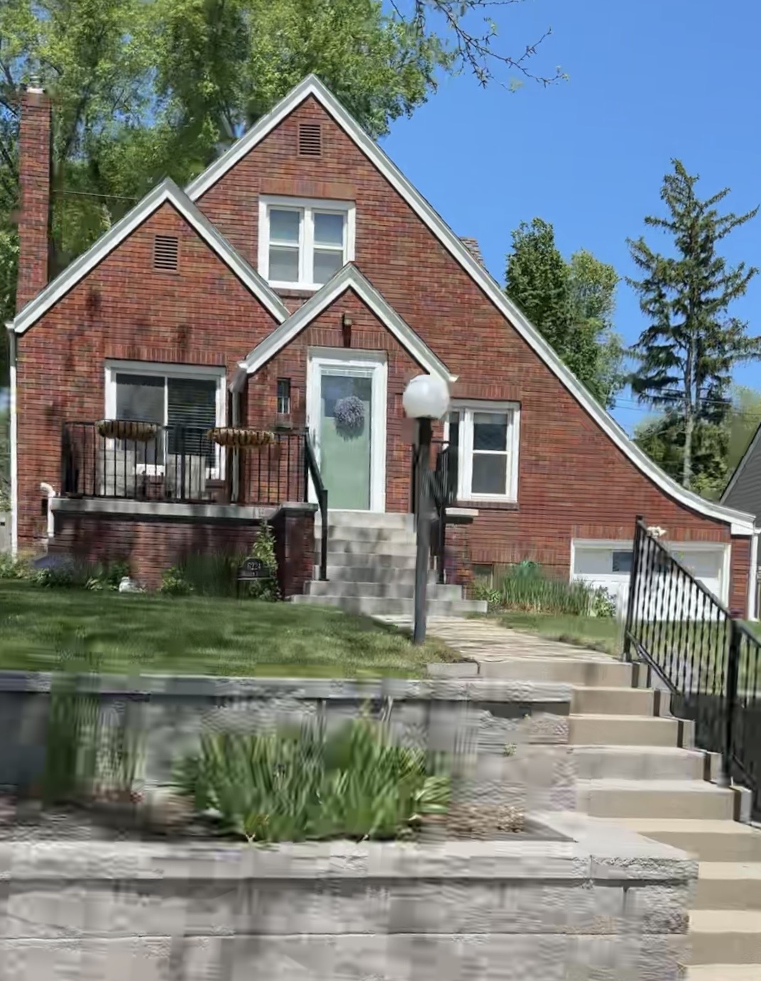 Brick Tudor Revival home in the Aksarben neighborhood of Omaha