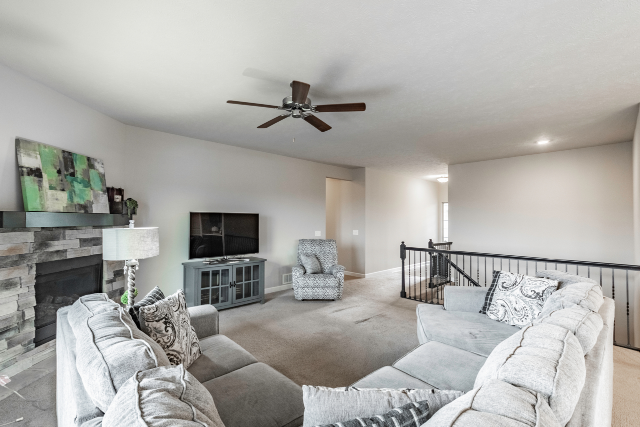 Staged living room in an Omaha home prepared to show well, strengthening a contingent offer.