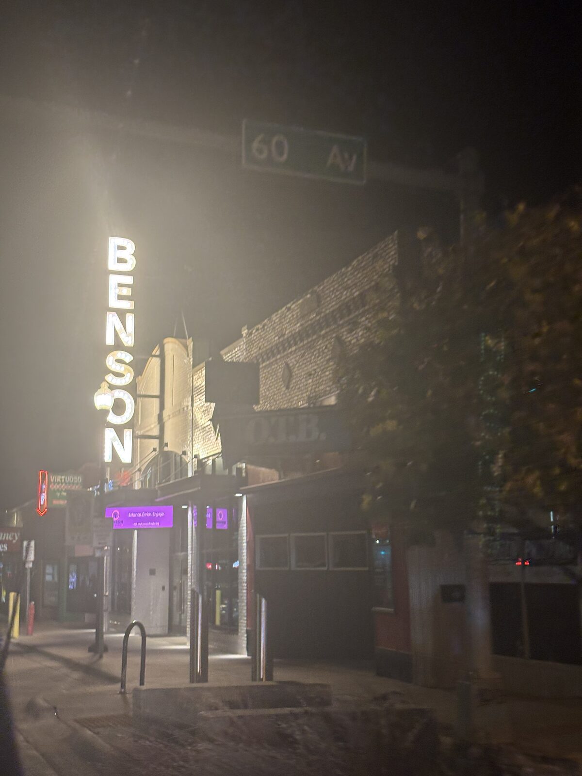 The Benson neighborhood sign at night in Omaha