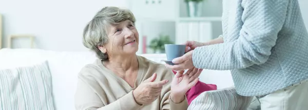 Helping elder lady