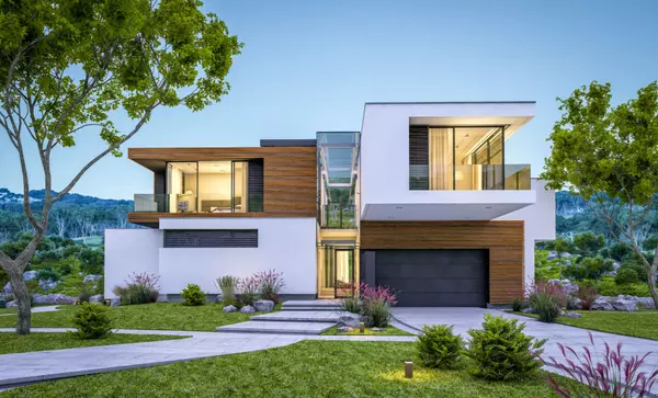 modern house by the river at evening