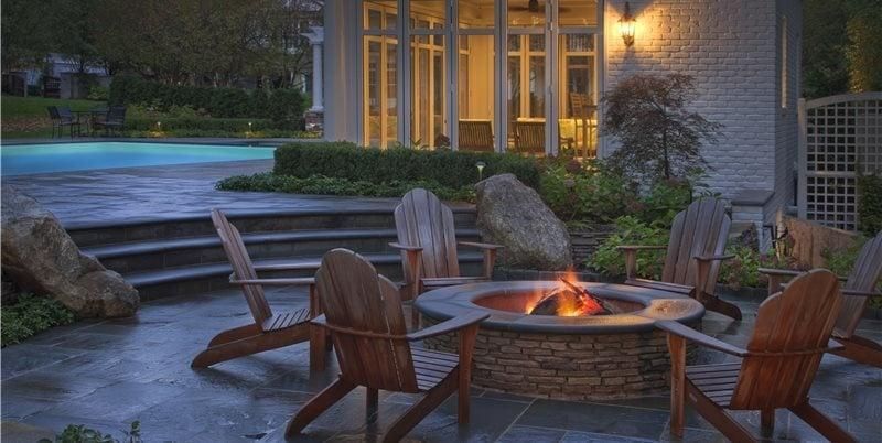 Outdoor fire pit and patio area at a Brighton Michigan home