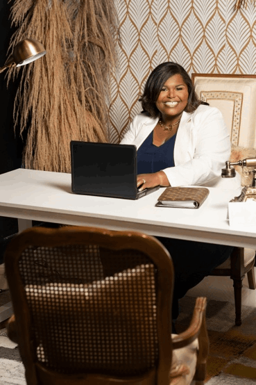 Angela at her desk