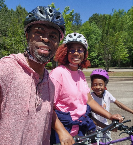 Lamar, Ivy, and Imajen biking