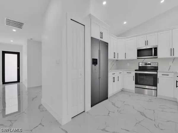 105/107 Meadow RD, Lehigh Acres, FL 33973