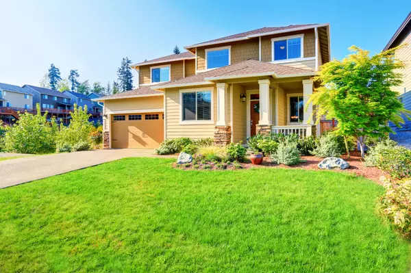 Beautiful curb appeal of luxury beige house