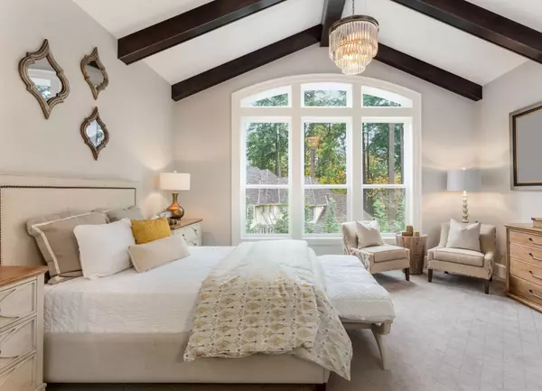 Beautiful furnished master bedroom interior in luxury home