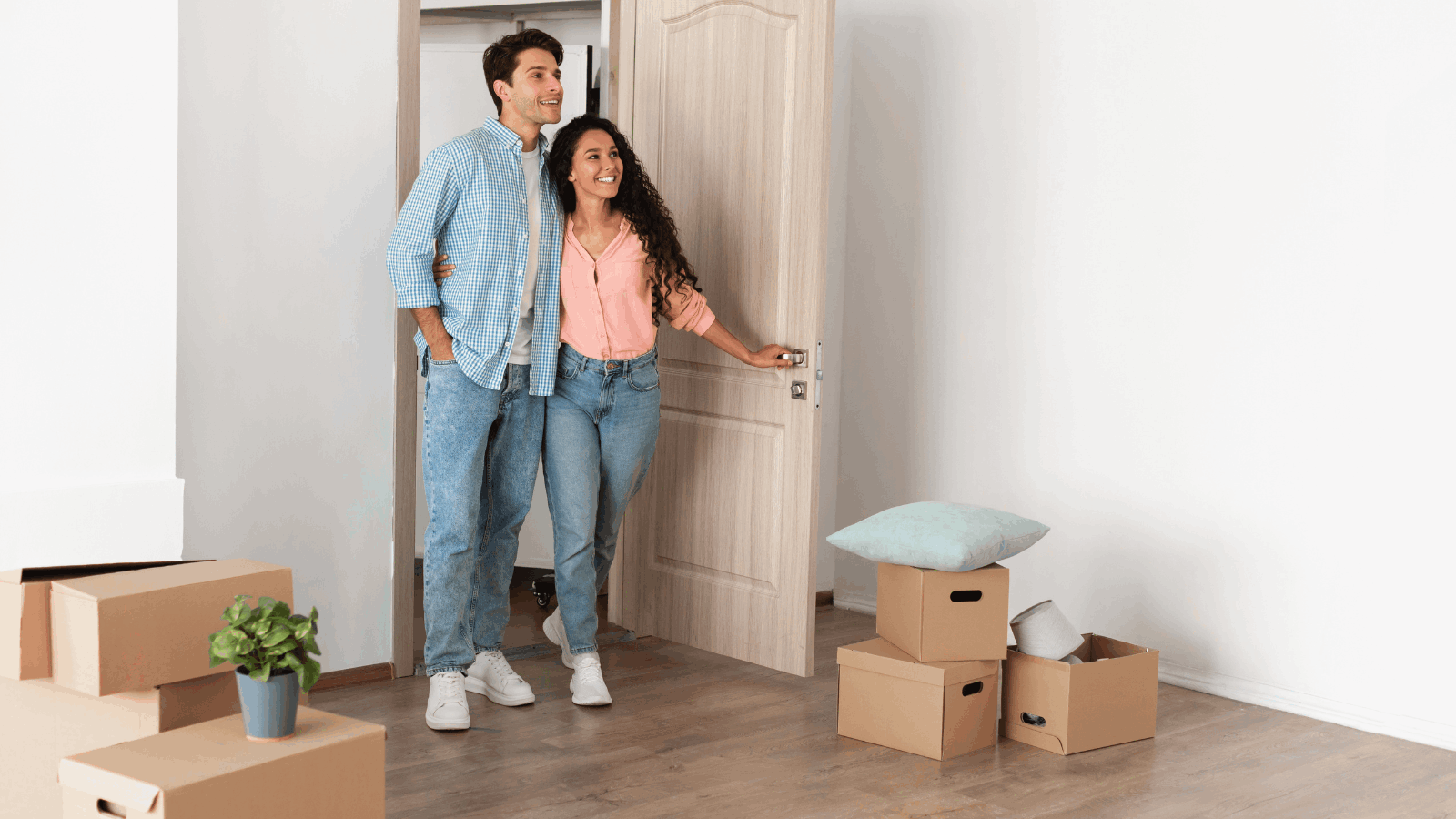 Couple reviewing mortgage rates and home buying options on a laptop
