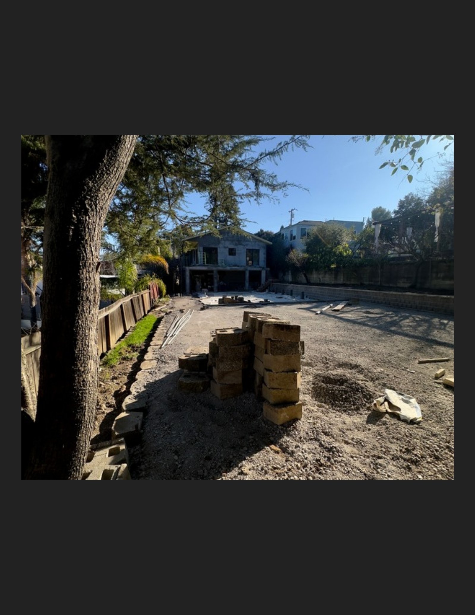 Pavers staged in the backyard