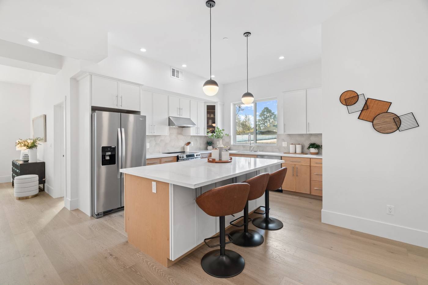 Kitchen with island and pendant lights