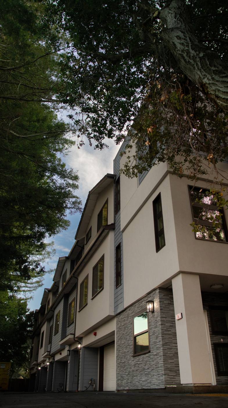 Redwood Row townhomes at dusk