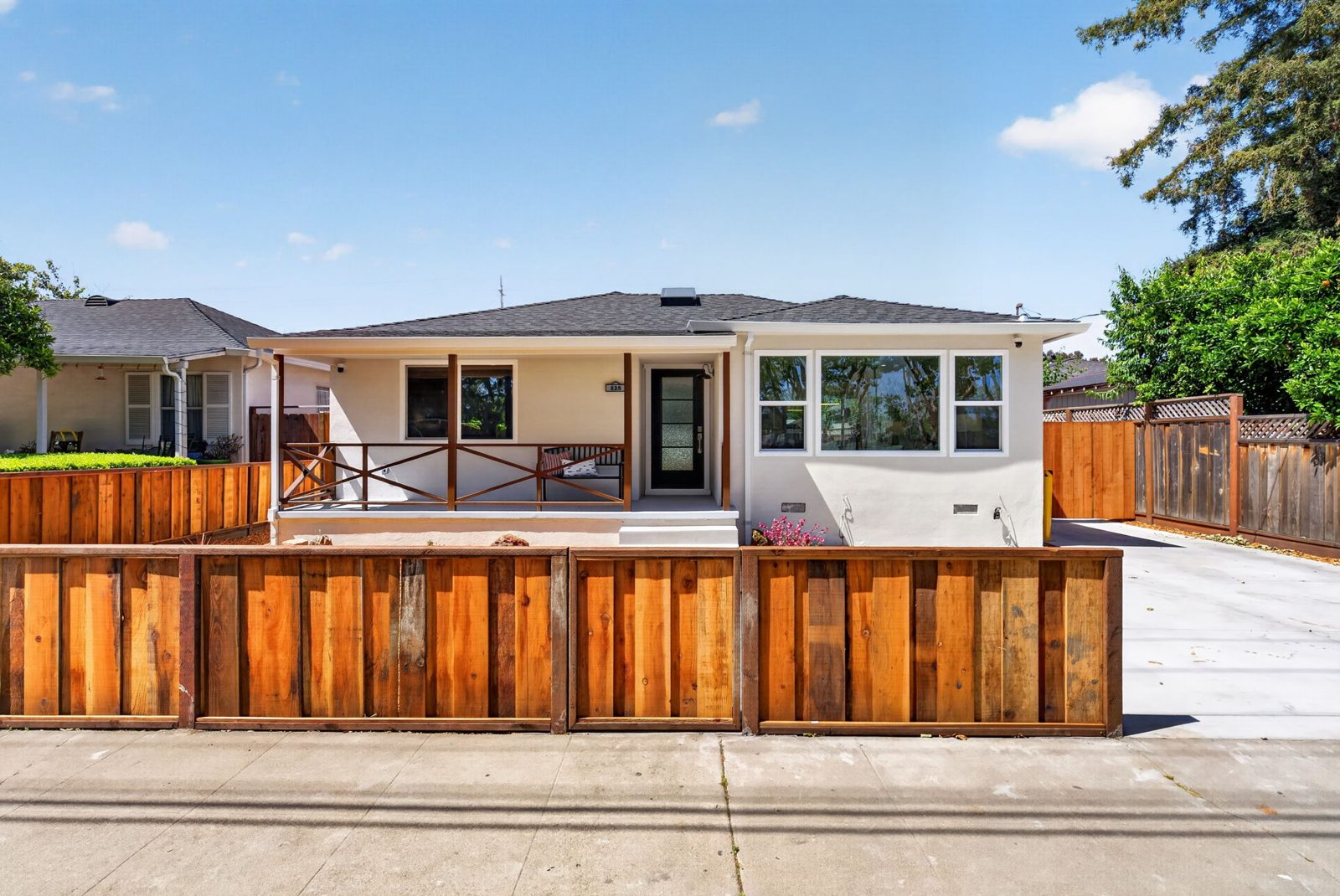 The front of 225 N El Dorado after the remodel: new roof, new windows, fresh paint and a repoured driveway.
