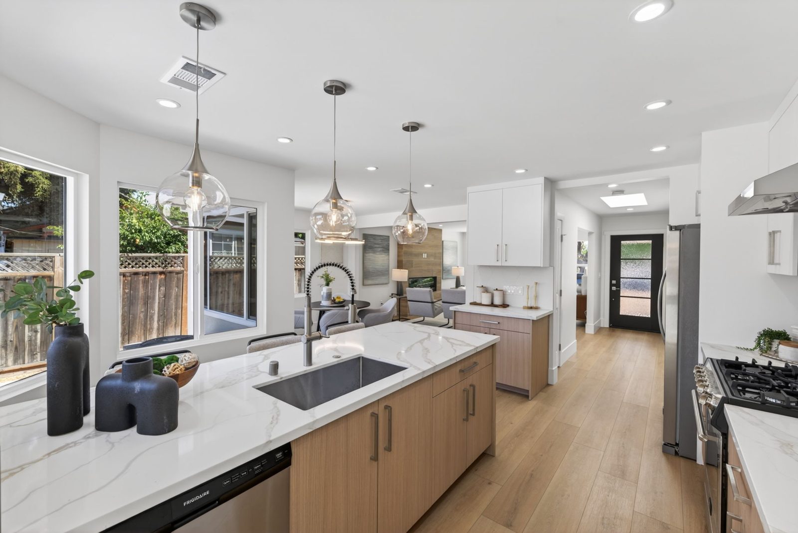 Kitchen island with pendant lighting and counter seating.